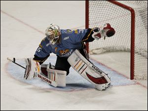 Walleye goalie Alec Richards makes a stop against the Cincinnati Cyclones earlier this week.