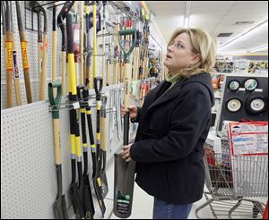 Cynthia Wagner shops at Fleeger's, where Laura Fleeger-Koenig says most sales are small-ticket items.