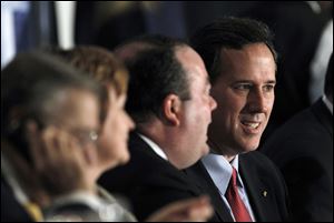 Republican presidential candidate and former Pennsylvania Sen. Rick Santorum attends a Economic Club of Detroit luncheon Thursday in Detroit.