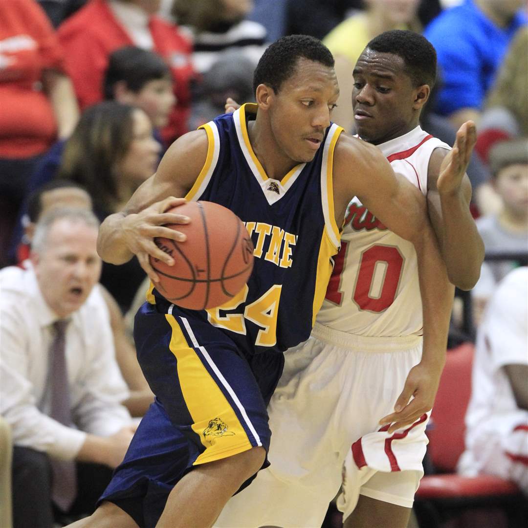 Central-Catholic-Dexter-Johnson-guards-Whitmer-Leroy-Alexander-Friday