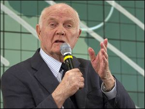 Former Sen. John Glenn answers a question at the Kennedy Space Center Friday in Cape Canaveral, Fla.
