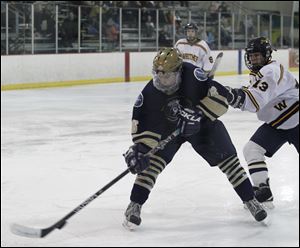 Colin Suter, a junior forward, is second in points for St. John’s
with 37. He has scored 14 goals.