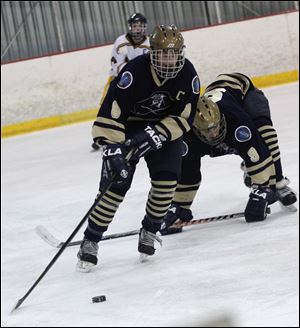 Nate Bigelow, a senior forward, has 10 goals and 15 assists for the Titans.