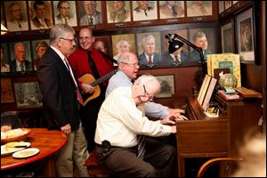 Tile Club members, from left, David Smith, Larry Golba, Jack Straub, club president, and Ken White.