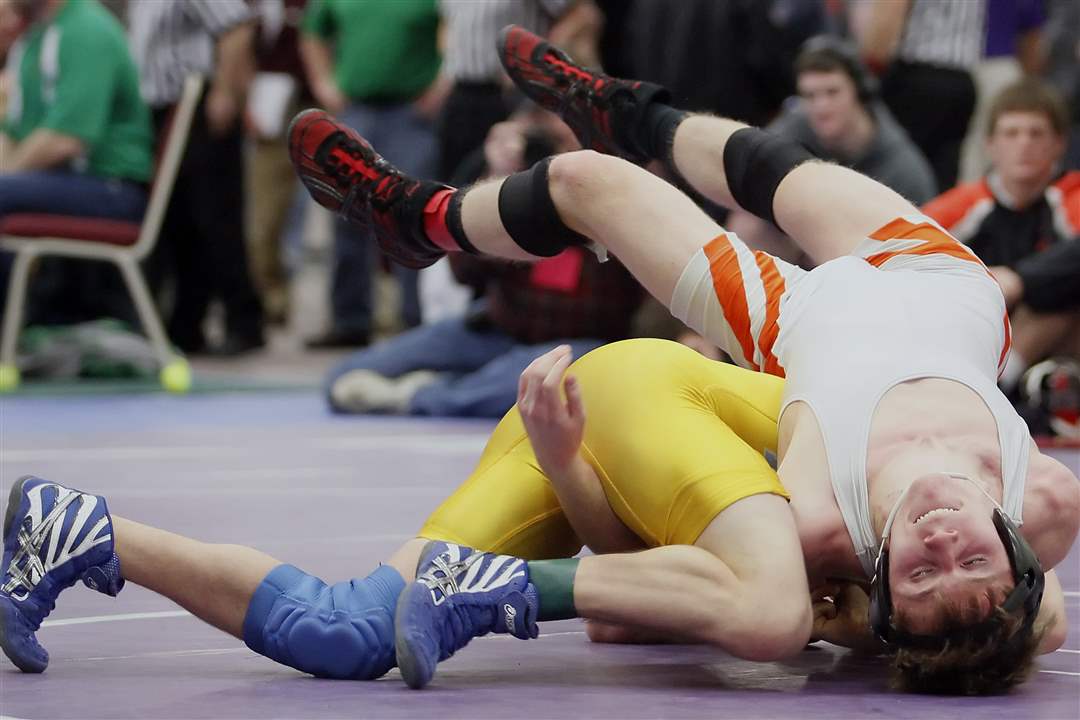 Cade-Mansfield-of-Ayersville-defeats-Damien-Showman-of-Seneca-East-12-3-in-the-120-pound-weight-class