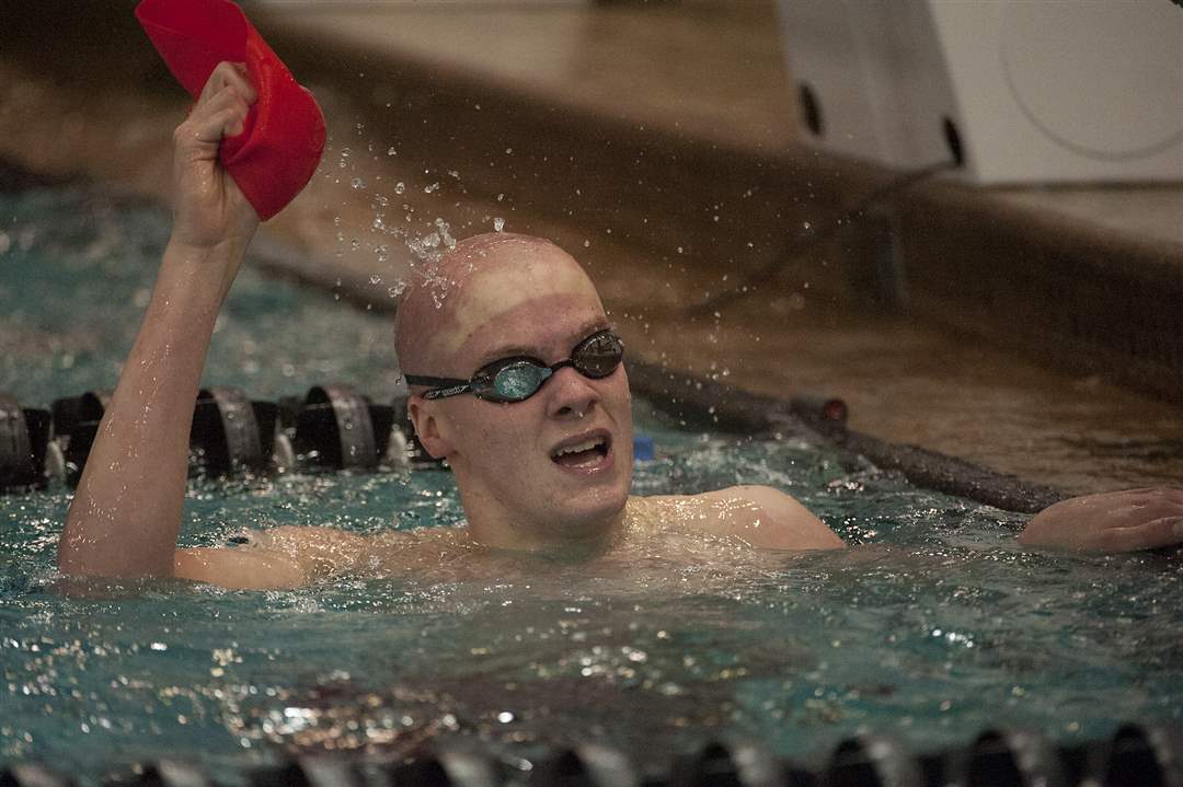 Mat-Zimmerman-of-Toledo-St-Frances-De-Sales-looks-to-the-scoreboard-after-finishing-the-Men-s-200-yard-Freestyle-event