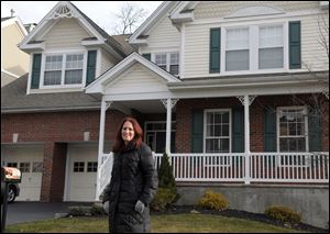 Jaimie Bolnick and her ex-husband, Michael Bolnick, lived together as they tried to sell their Oakland, N.J., house. Agents say divorcing spouses are better off if they can keep their emotions under control.