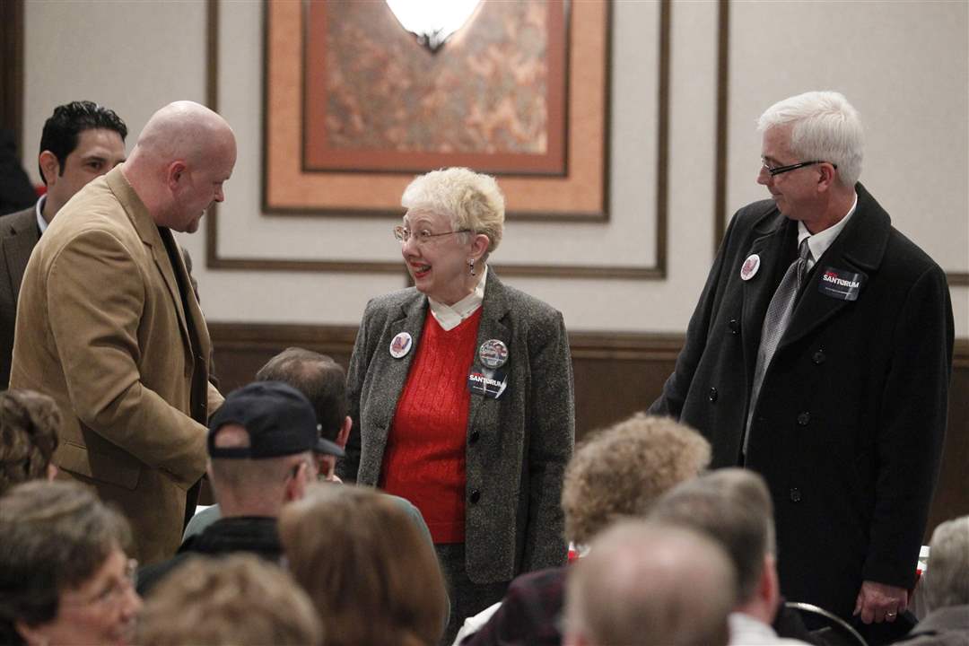 Samuel-Joseph-Wurzelbacher-left-speaks-with-Joanne-Arndt-President-of-the-Erie-County-Republican-Party