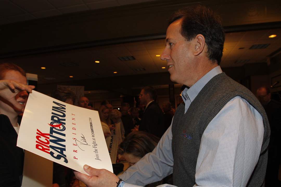 Republican-presidential-candidate-Rick-Santorum-meets-with-supporters