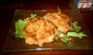 The pan-seared crab cakes were full but light, with a nice spicy kick