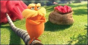 Lorax, voiced by Danny Devito, is shown in a scene from 'Dr. Seuss' The Lorax.'