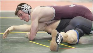 Genoa's Jake Sheehy pinned Smithville's Mark Hilty in the 182-pound tournament.