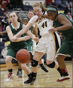 Northview's Maddie Cole (44) battles for a loose ball with Central Catholic's Michelle Murnen (33) and Sydni Harmon. Northview is now 21-1 on the season, while the Irish finish the year at 13-9.