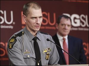 Ohio Highway Patrol Lt. Dean Laubacher talks about the crash Friday during a news conference on the BGSU campus. Behind him is Rodney Rogers, BGSU senior vice-president for academic affairs and provost.