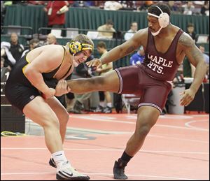 Clay's Garrett Gray advanced to the 285-pound championship, beating Maple Height's Aaron Pipkins.