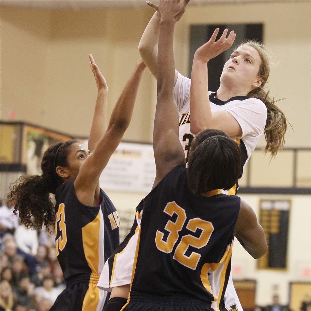 Northview-s-Miriam-Justinger-goes-up-for-a-shot-against-Notre-Dame-s-Ashley-Kynard-left-and-Michelle-Holmes