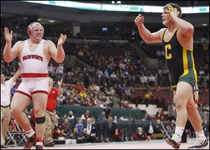 Garrett Gray of Oregon Clay loses to Nick Tavanello of Wadsworth in the Division I 285 pound championship match in multiple overtimes during the State Wrestling Tournament Saturday, in Columbus, Ohio.