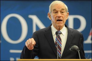 Republican presidential candidate Rep. Ron Paul, R-Texas, addresses a gathering of supporters at a rally in Nampa, Idaho.