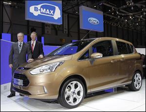 Stephen Odell, left, CEO of Ford Europe, and Alan Mullaly president and CEO of Ford Motor Co., introduce the Ford B-Max during a press preview Tuesday at the 82nd Geneva International Motor Show in Geneva, Switzerland. T