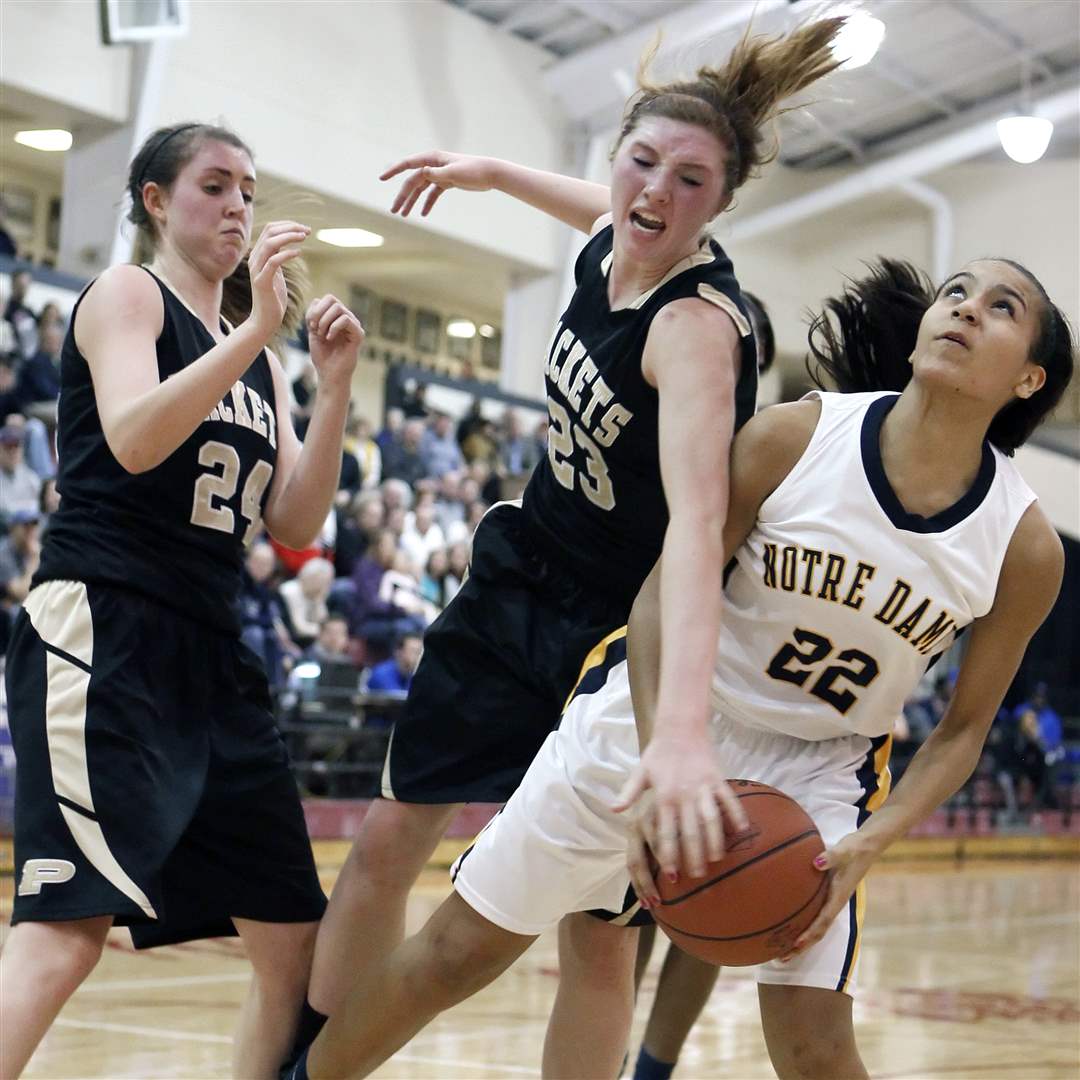 Notre-Dame-s-Emily-Treece-22-goes-to-the-net-against-Perrysburg-s-Sarah-Baer