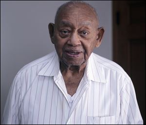 George Kendrick of Toledo, who turned 100 on Feb. 29, still mows his lawn and drives his Lincoln Town Car.