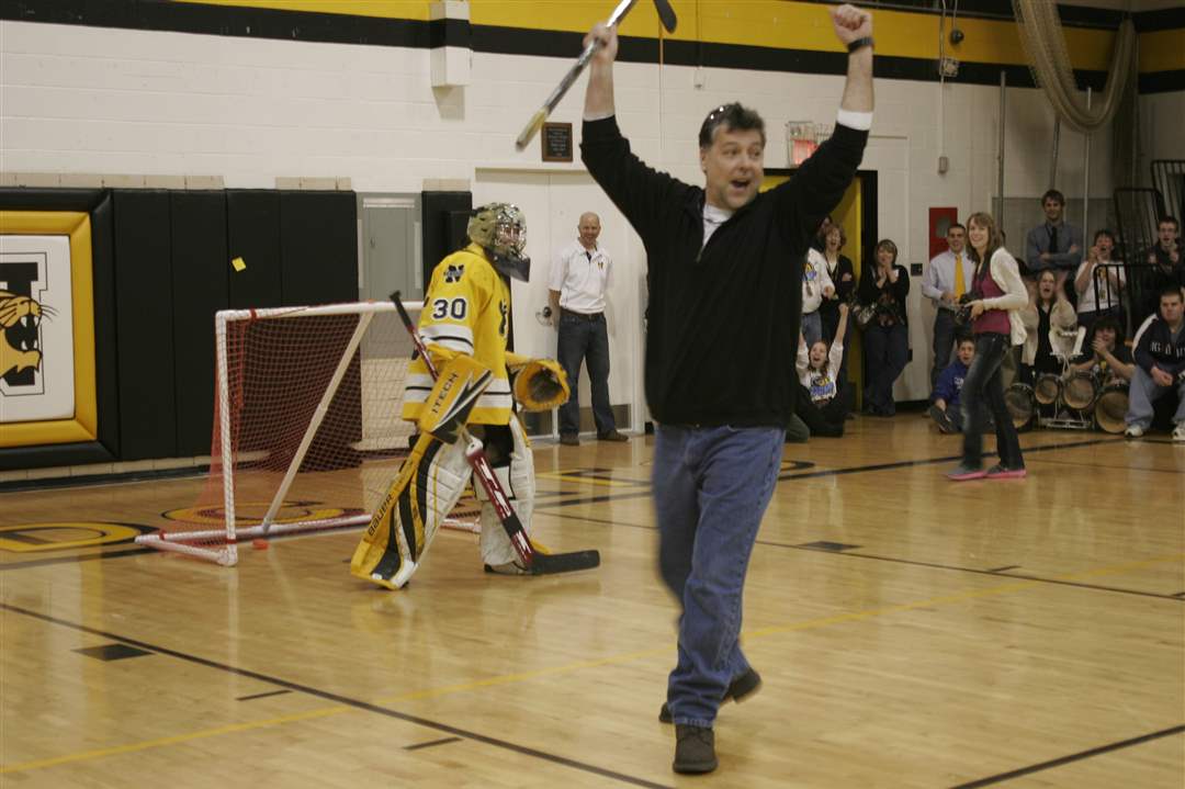 A-hockey-player-s-parent-scored-a-goal-to-win-a-pair-of-passes-to-the-state-tournament