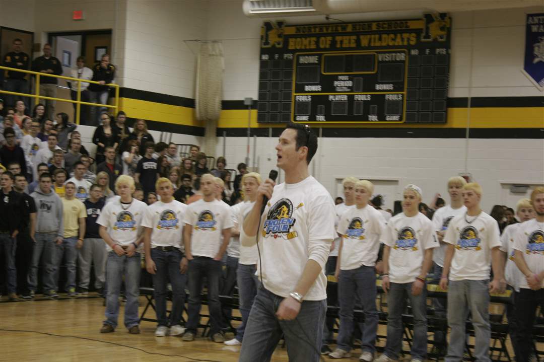 Mike-Jones-Northview-hockey-head-coach-gets-the-students-excited