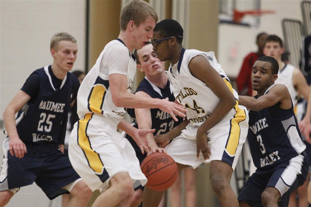 Maumee-Valley-Jonathan-Krueger-tries-to-get-ball-from-Toledo-Christian-Cordell-Miller