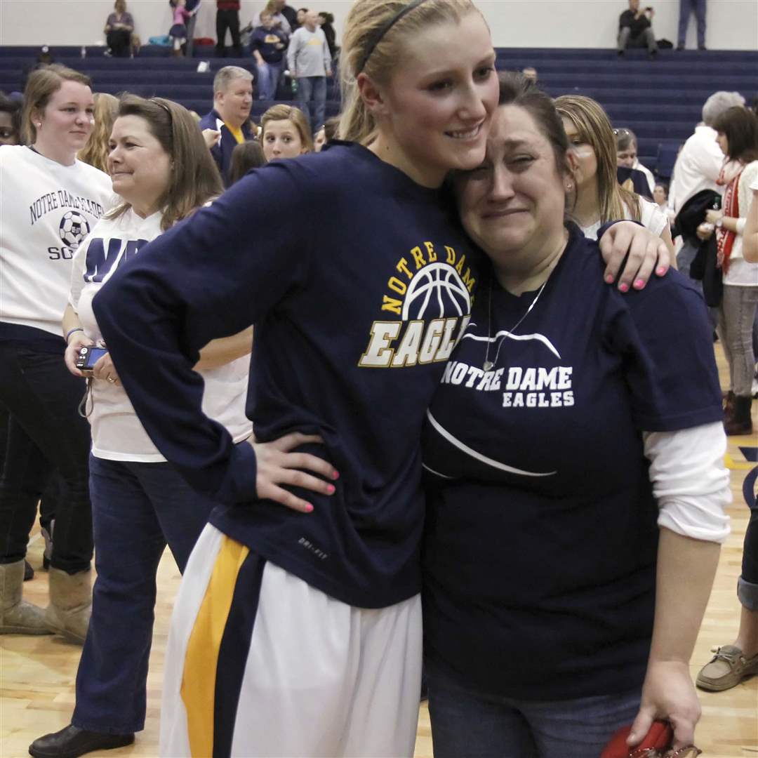 Notre-Dame-s-Demy-Whitaker-is-hugged-by-her-mom-Amy-Whitaker