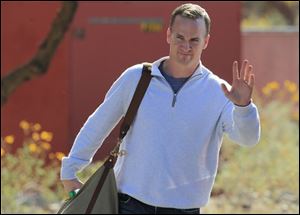 NFL quarterback Peyton Manning leaves the Arizona Cardinals training facility after a five hour meeting with coaches and front office staff Sunday.