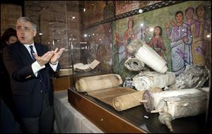 Scott Carroll leads a tour of items from the Green Collection on display at the Vatican.