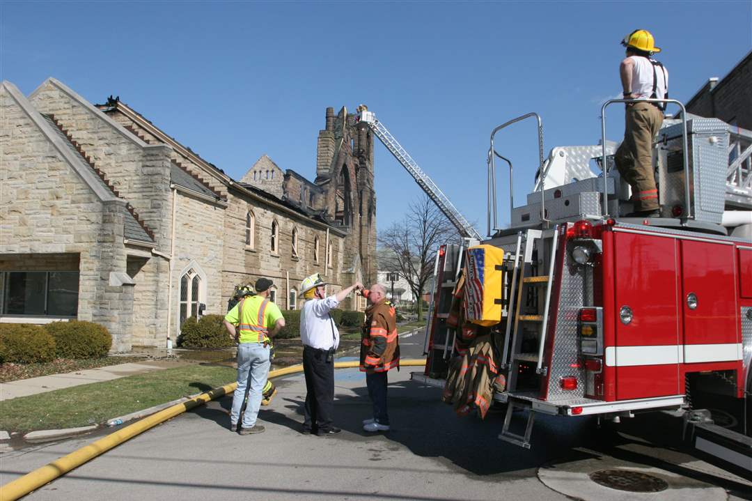 Firefighters-continue-to-battle-a-church-fire