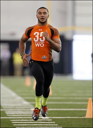 Eric Page, at the annual pro day at UT, finished the 40-yard dash in anywhere from 4.51 to 4.55 seconds.