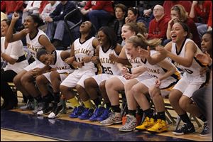 The Notre Dame bench goes wild after their team goes ahead with only minutes left in the D-I regional final against Wadsworth at Norwalk High School. 