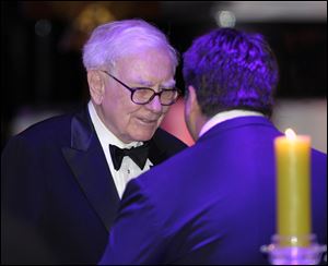 Billionaire and Berkshire Hathaway titan Warren Buffett was among the star-studded guest list at the state dinner for British Prime Minister David Cameron.