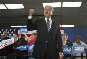 Vice President Joe Biden greets the crowd Thursday at the UAW Local 12 Hall in Toledo.