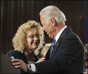 Michelle 'Shelley' Whitson, who had been laid off from her job at Jeep and later rehired, introduces Vice President Joe Biden at UAW Local 12. She said she understood that the President's decision to bail out the auto industry was a tough one. Mr. Biden acknowledged that too. But, he said, 'The verdict is in. President Obama was right. …'