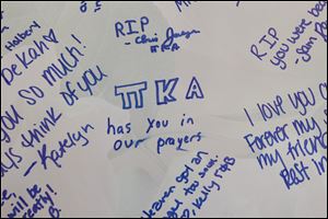 Notes on a memory board express the sense of loss of the signers. The three sorority women were killed March 2 in a wrong-way crash as they drove to Detroit to catch a flight for a spring-break trip.
