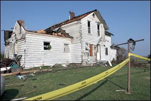 The Monroe area was hit by powerful storms, hail and a tornado causing damage to the Montri family farmhouse.