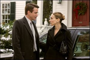 Everett Stone (Dermot Mulroney) tries to reassure his girlfriend Meredith Morton (Sarah Jessica Parker), who is nervous about meeting his family, in the film 'The Family Stone.' 
