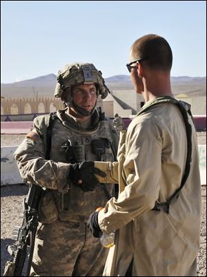 Sgt. Robert Bales, left, struggled to make payments on his home and had planned to leave the military after being denied a promotion.
