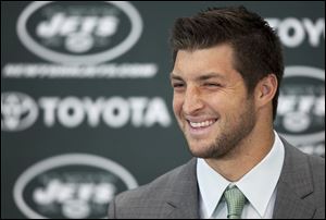 Tim Tebow holds his first news conference with the New York Jets, Monday in Florham Park, N.J.