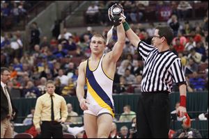 Archbold’s Jordan Cowell wins the Division III state title at 152 pounds. He set the Ohio record with 237 career wins.