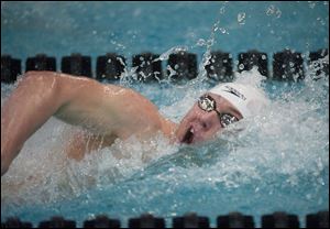 Dan DiSalle of St. Francis competes in the 100-yard freestyle, one of two events he won at the Division I state swimming championships in Canton. The senior also won a title in the 50 free.