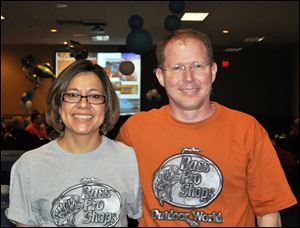 Martha and Ryan Bradley donned their Bass Pro Shop T-shirts for the Hooked on TCS banquet to benefit Toledo Christian Schools.