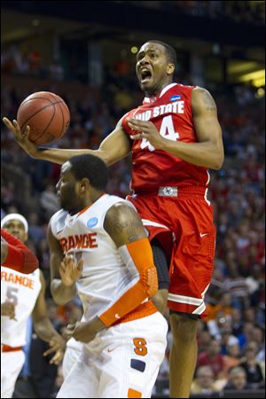 Ohio State's William Buford takes a shot in the Buckeyes' win over Syracuse in the Elite 8. He struggled from the field shooting, but managed to grab a team-high nine rebounds for the Buckeyes.