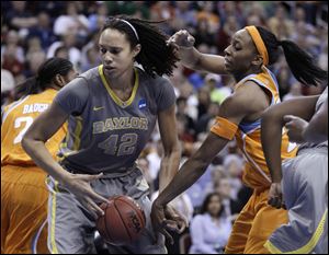 With 6-foot-8 star Brittney Griner, left, and a lineup loaded in every position, Baylor is favored to win the NCAA women's championship Tuesday at the Pepsi Center in Denver.associated press