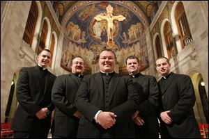 Five Northwest Ohio men are to be ordained Saturday by Bishop Leonard Blair in Rosary Cathedral as transitional deacons in the Toledo Catholic Diocese, a key step in the path to priesthood. Gathered at Rosary Cathedral, where the ceremony is to take place, they are, from left, Nathan Bockrath of Glandorf, Chris Mileski of Tiffin, Jeffery Walker of Custar, Scott Carroll of Maumee, and Jeremy Miller of Marblehead. The 11 a.m. ceremony is to be broadcast live on WNOC-FM (89.7). The class is the diocese’s largest since 2009. No Toledo seminarians are scheduled to be ordained as priests this year.
