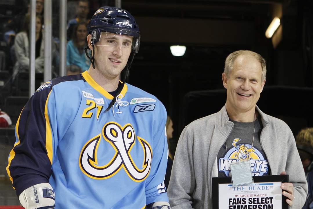 Left-to-right-Walleye-player-Riley-Emmerson-is-honored