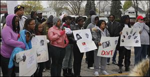 Hooded jackets of the type Trayvon Martin was wearing when he was killed were worn by many in the crowd.